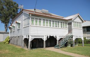 REDUCED TO $239,000 - RETURNS $360 per Week - HIGH SET WEATHERBOARD HOME - A PINE INTERIOR - LARGE  SHED - REAR LANE ACCESS.